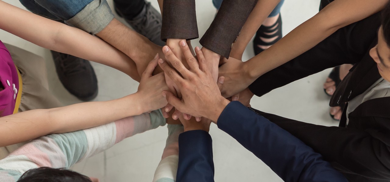 Business Professional success of organization. Successful business team work. .The organization of conferences, event ,seminars,  Asian worker team.   Corporate social responsibility.; Shutterstock ID 1219808644; purchase_order: Pentair website I&D page; job: 